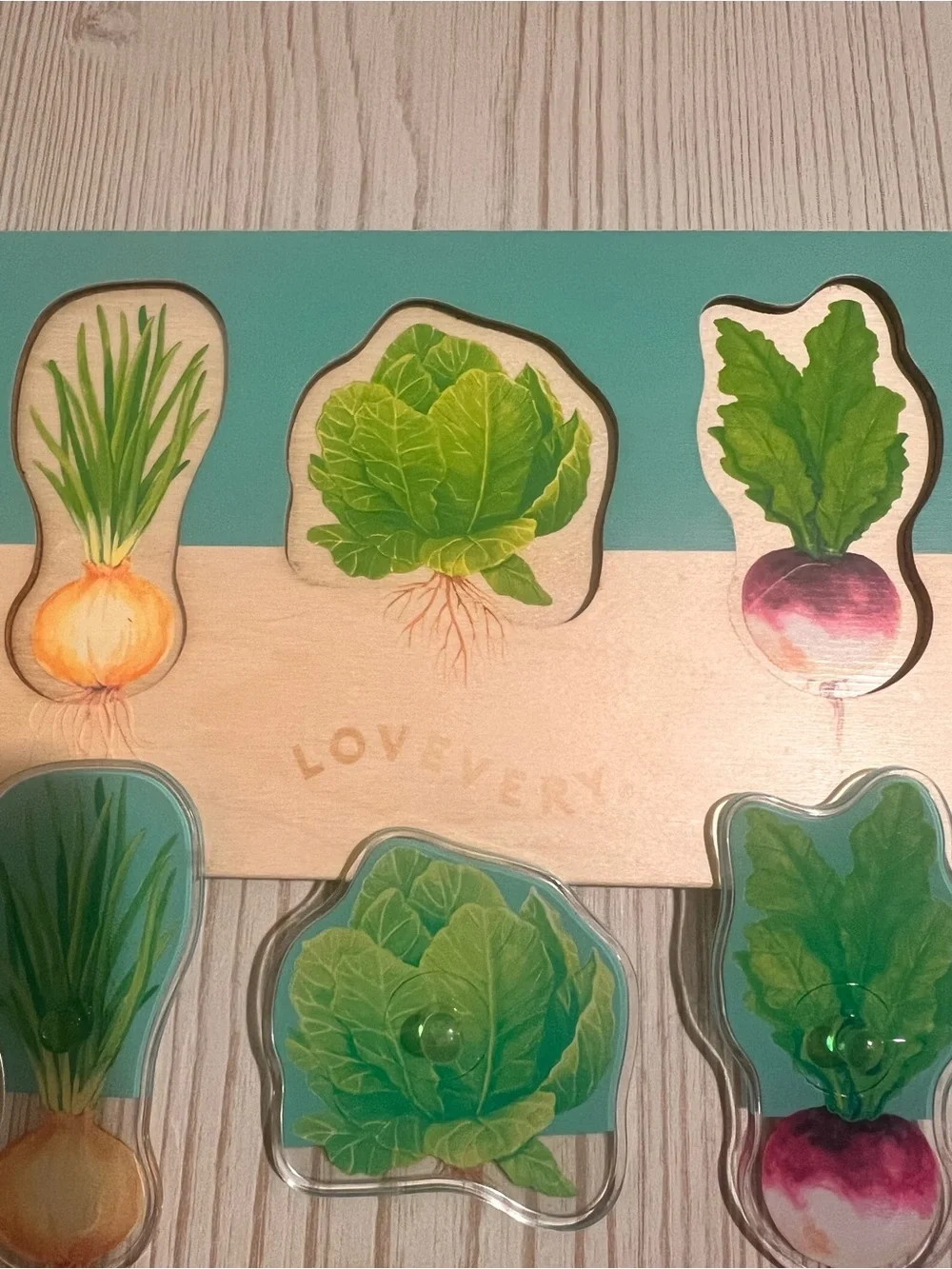 Lovevery Montessori Teal and Natural Wooden Garden Puzzle – Vegetable Set